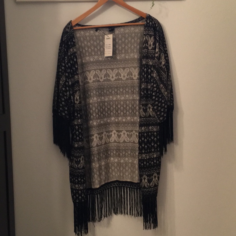 Fringed kimono style wrap.